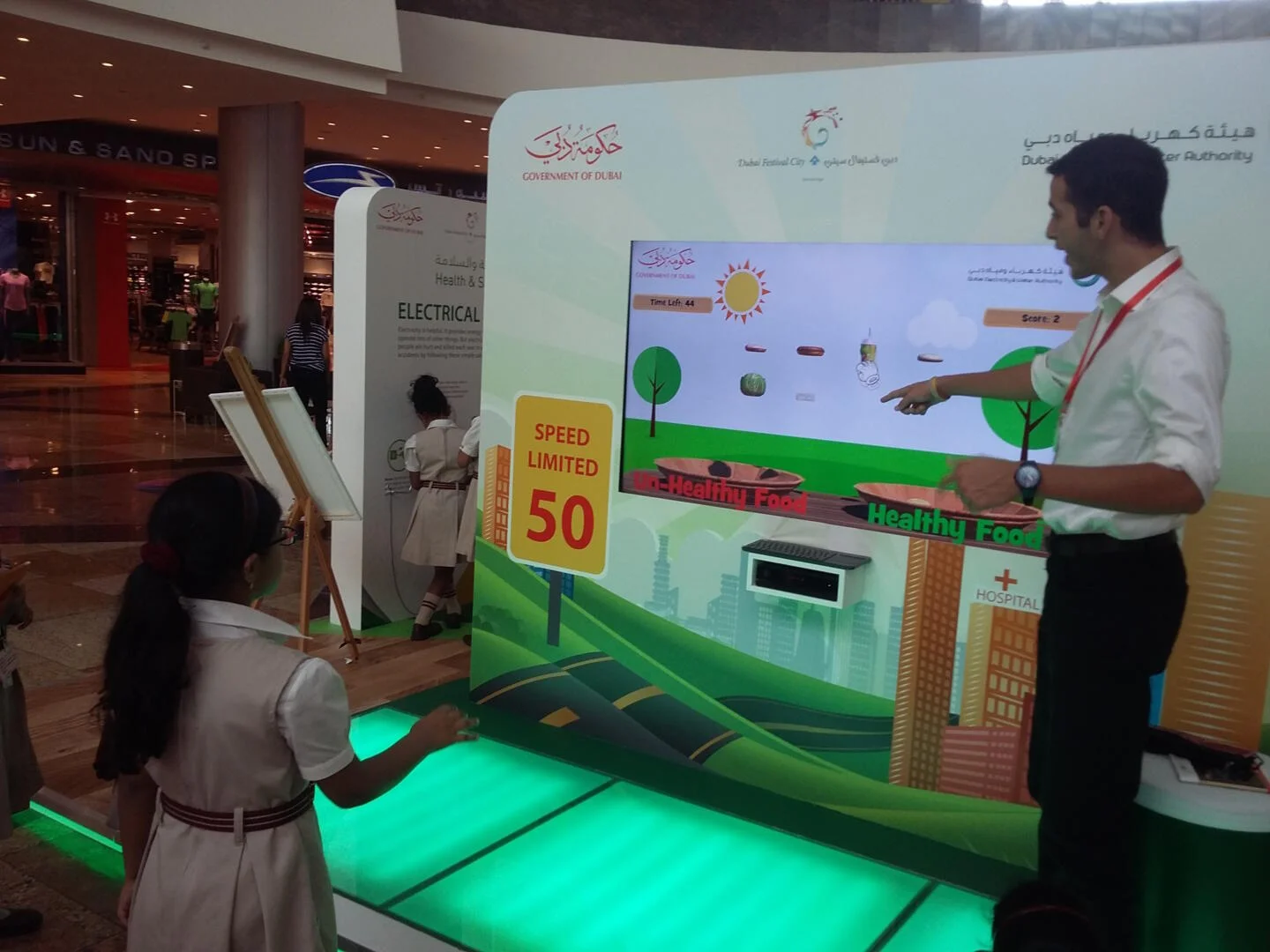 Children playing Healthy Basket gesture game at DEWA Festival City