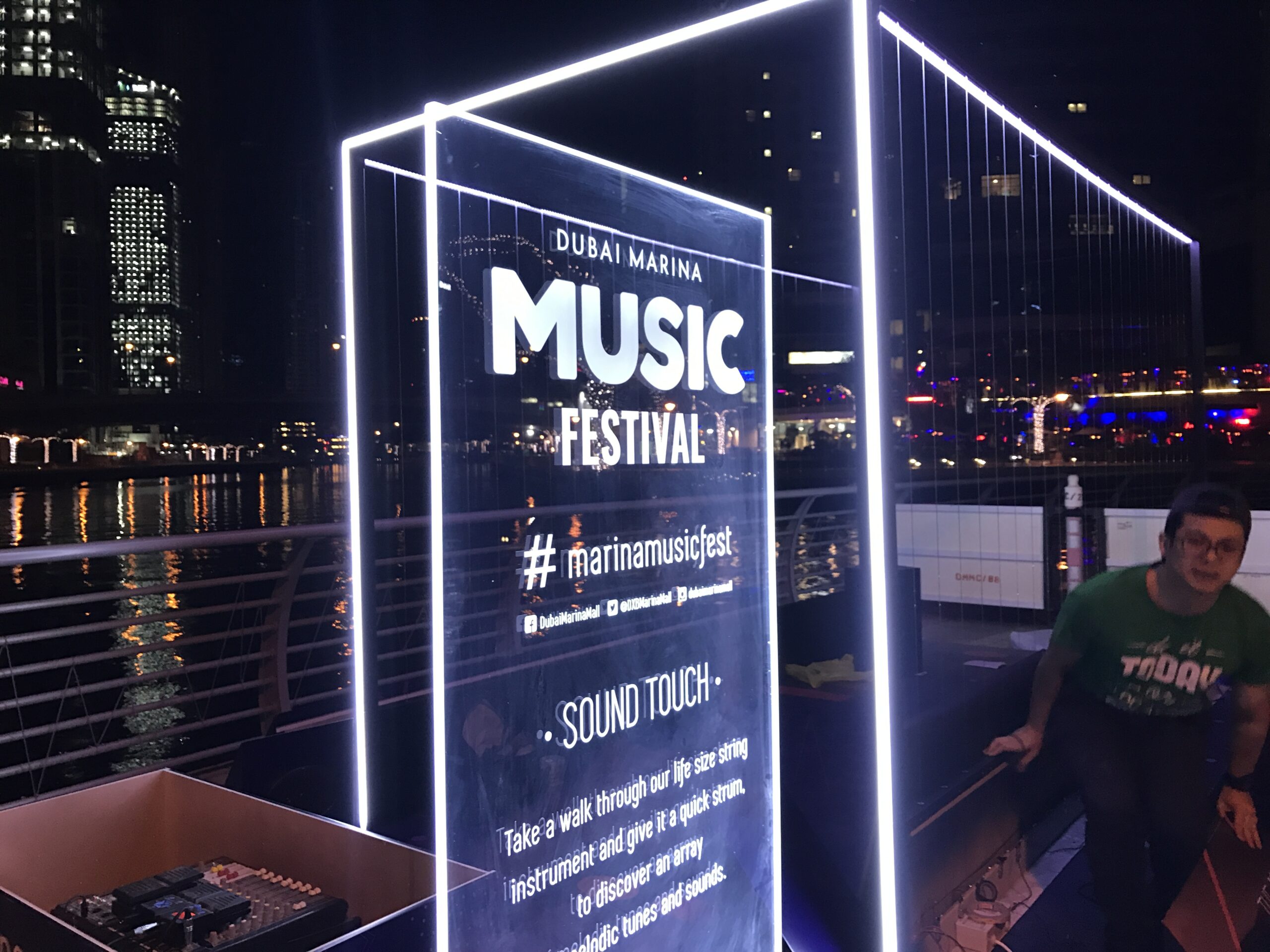 Interactive digital harp installation at Marina Musical Festival, motion-activated music exhibit, PearlQuest