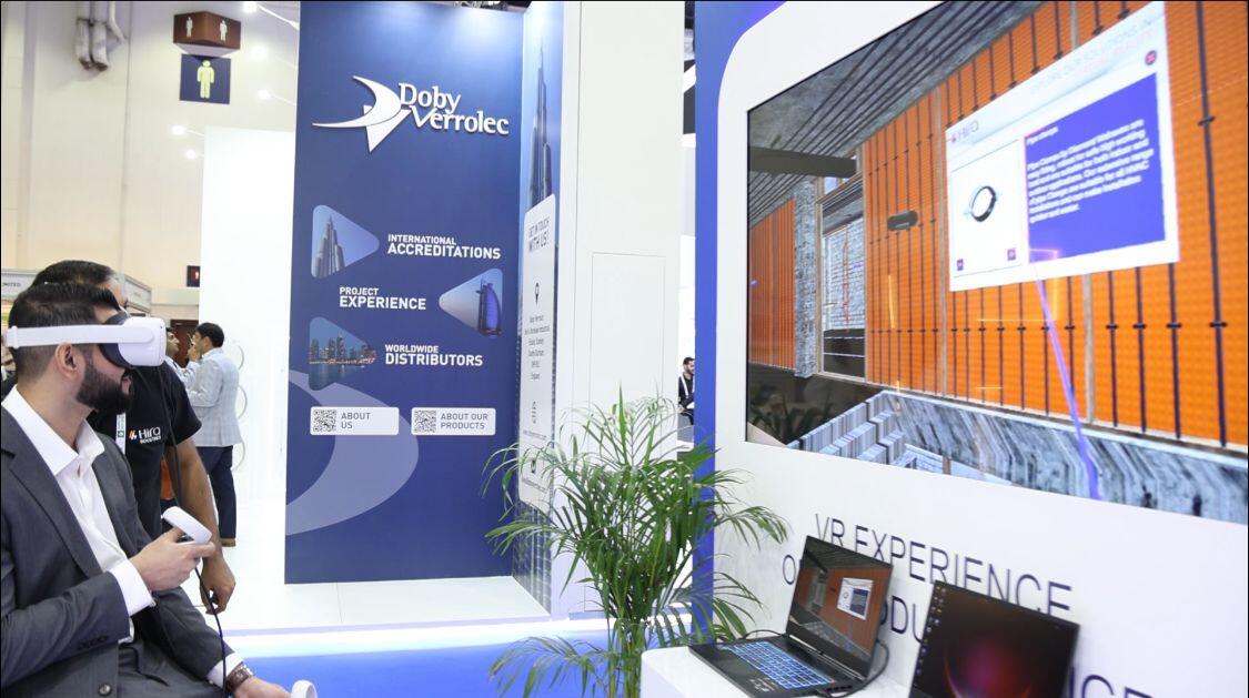 Person interacting with Hira Industries' VR product showcase in a virtual construction site.