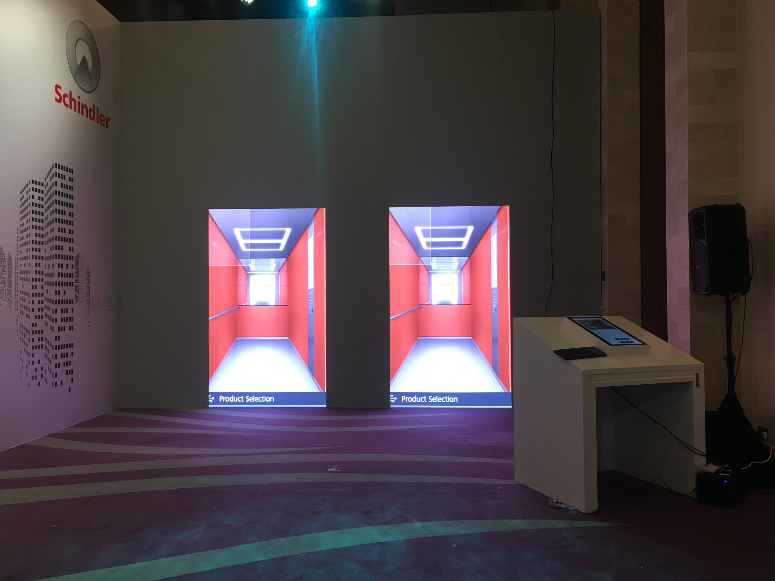 "- As everyone knows, Schindler has been a pioneer in elevator technology with a long tradition of developing innovative mobility solutions. - We created a 'Lift Interior Design' configurator for them using a touchscreen mapped to 2 large LEDs in portrait mode - The vertical LEDs gave an exact simulation of a lift and how it opens on a floor - Users could change colours, material and other parameters - This was a perfect simulated configurator case study, which was used at a vendor event successfully "