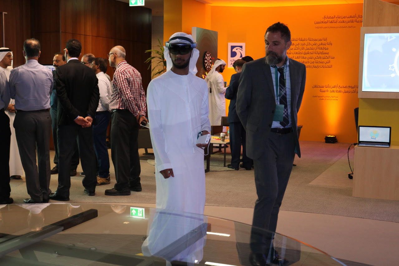 ADNOC employee using Microsoft HoloLens for Mixed Reality onboarding simulation.