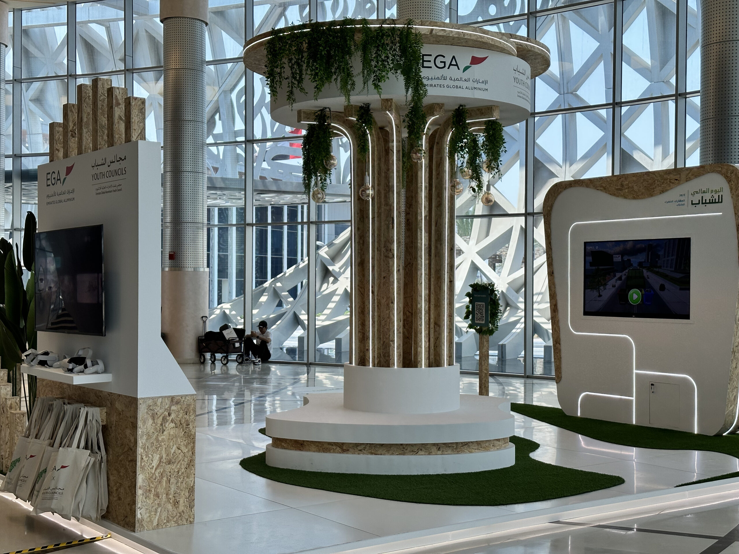 EGA Youth Council members using VR headsets for sustainability training simulation.