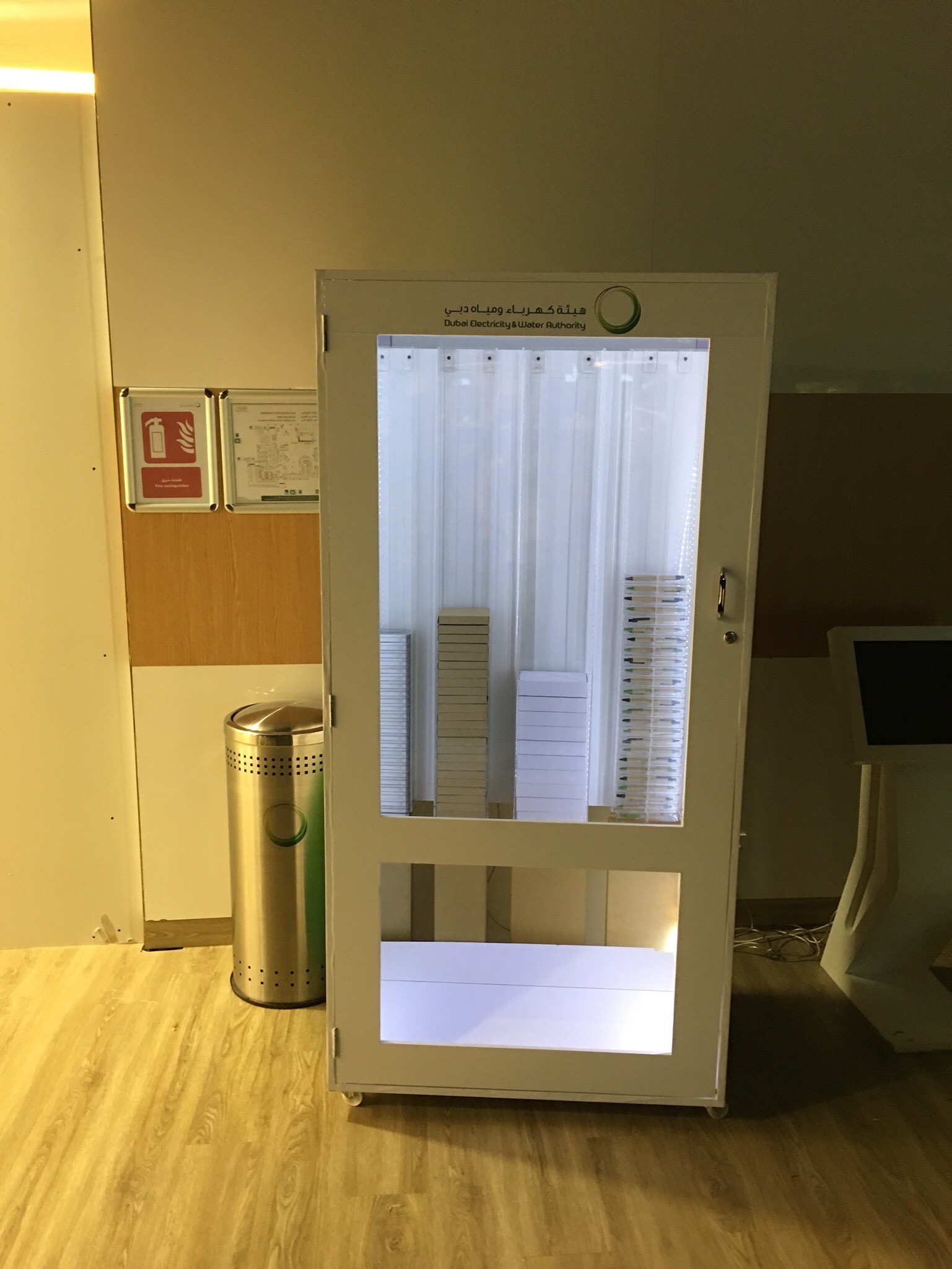 Custom touch-screen quiz vending machine for DEWA World Environment Day event.