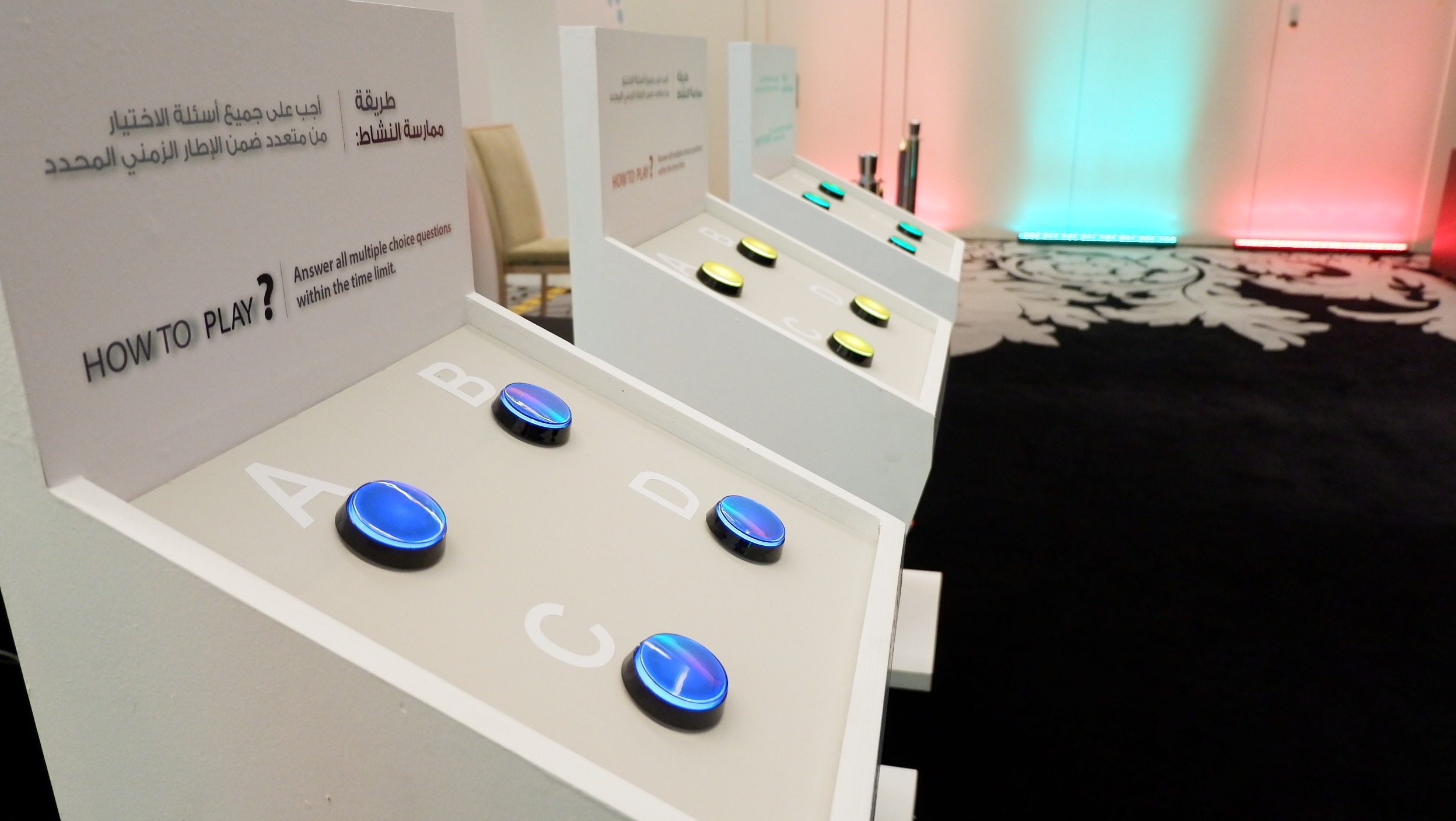 3-player interactive quiz kiosk with arcade buzzers for EAD employee engagement event.