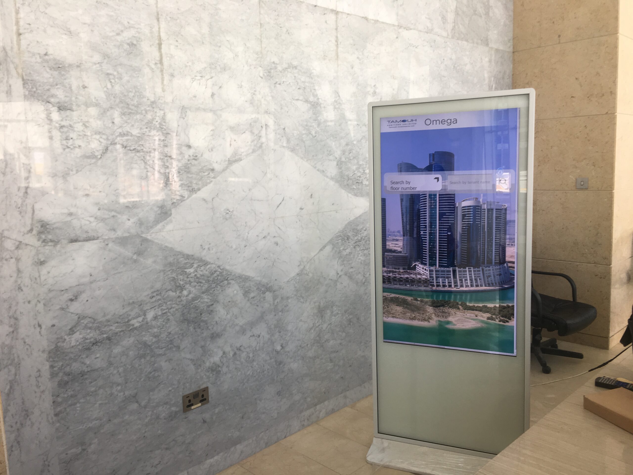 Interactive building directory kiosk at Omega Tower, Abu Dhabi.