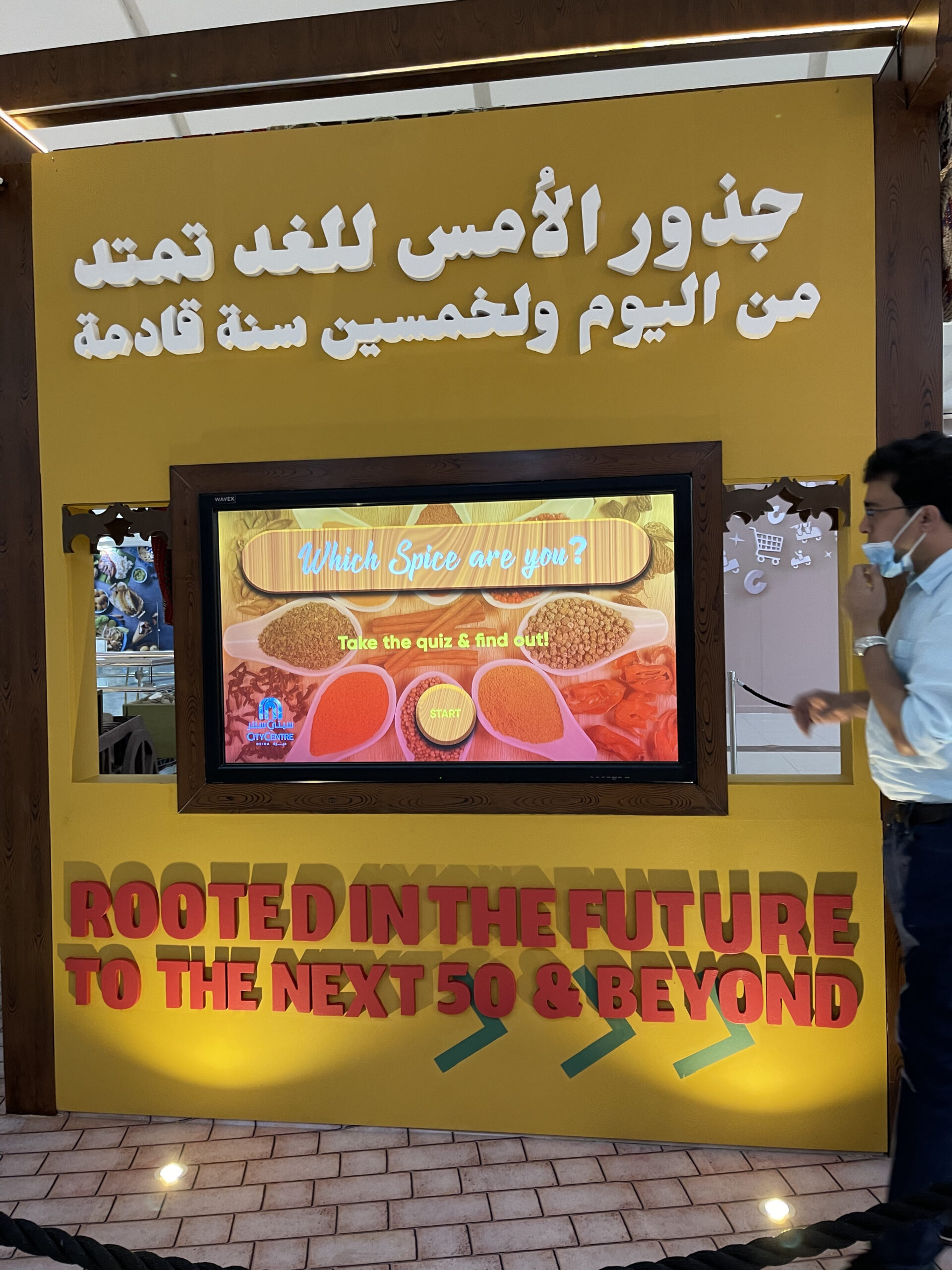 Interactive touchscreen kiosk featuring the 'Which Spice Are You?' game at Deira City Center.