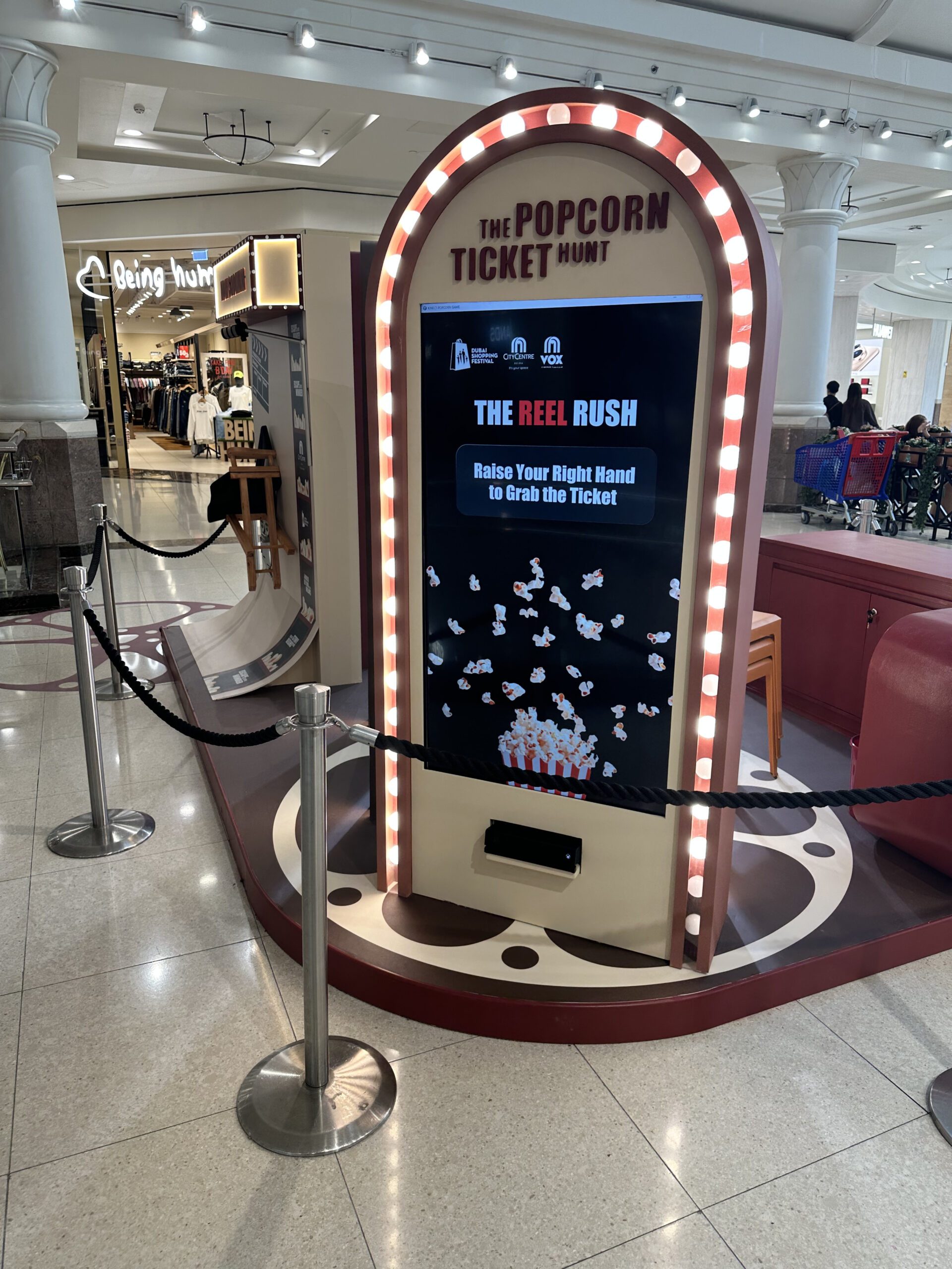 Reel Rush gesture-controlled popcorn game for Deira City Centre Vox Cinemas.