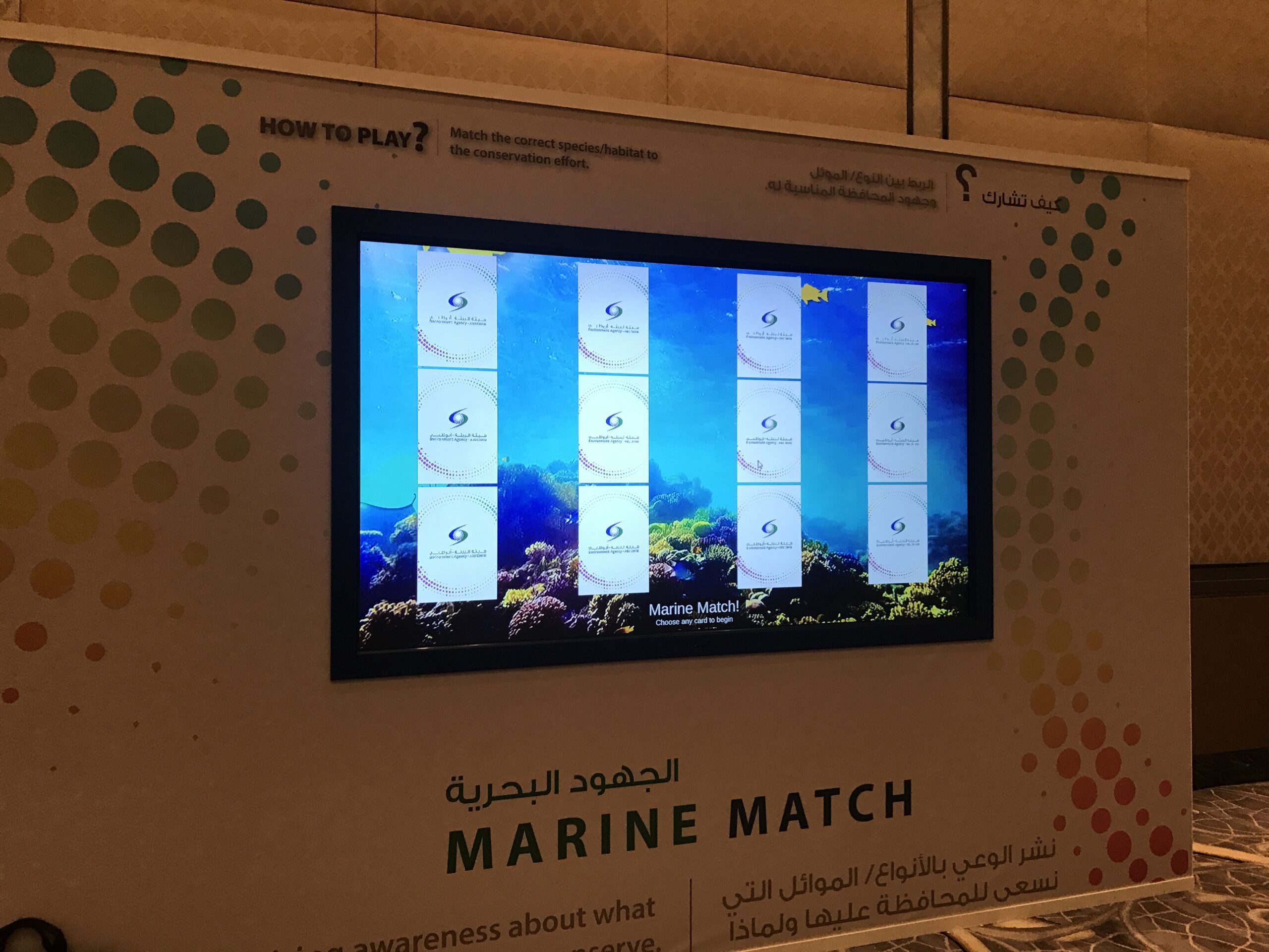 Large 85-inch touchscreen memory game for EAD employee engagement event.