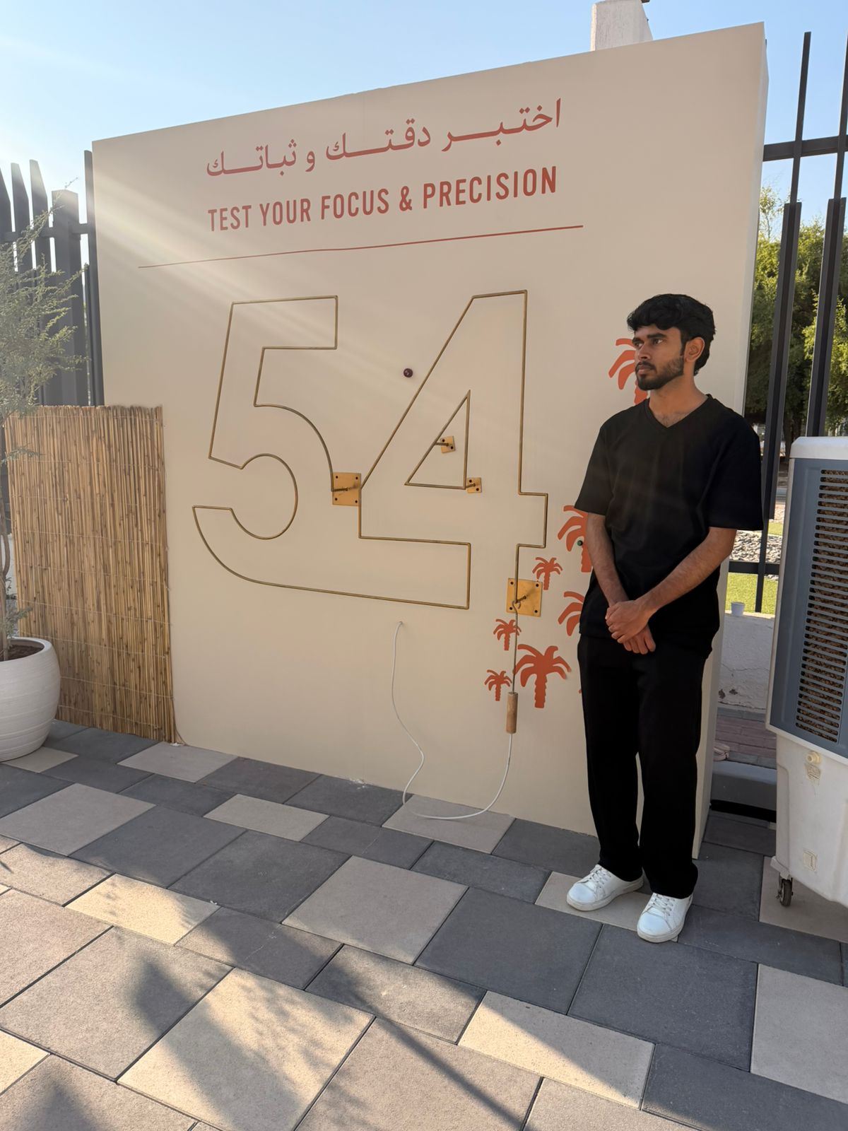 Large-scale BuzzWire 2025 game shaped like number 54 for UAE National Day event.