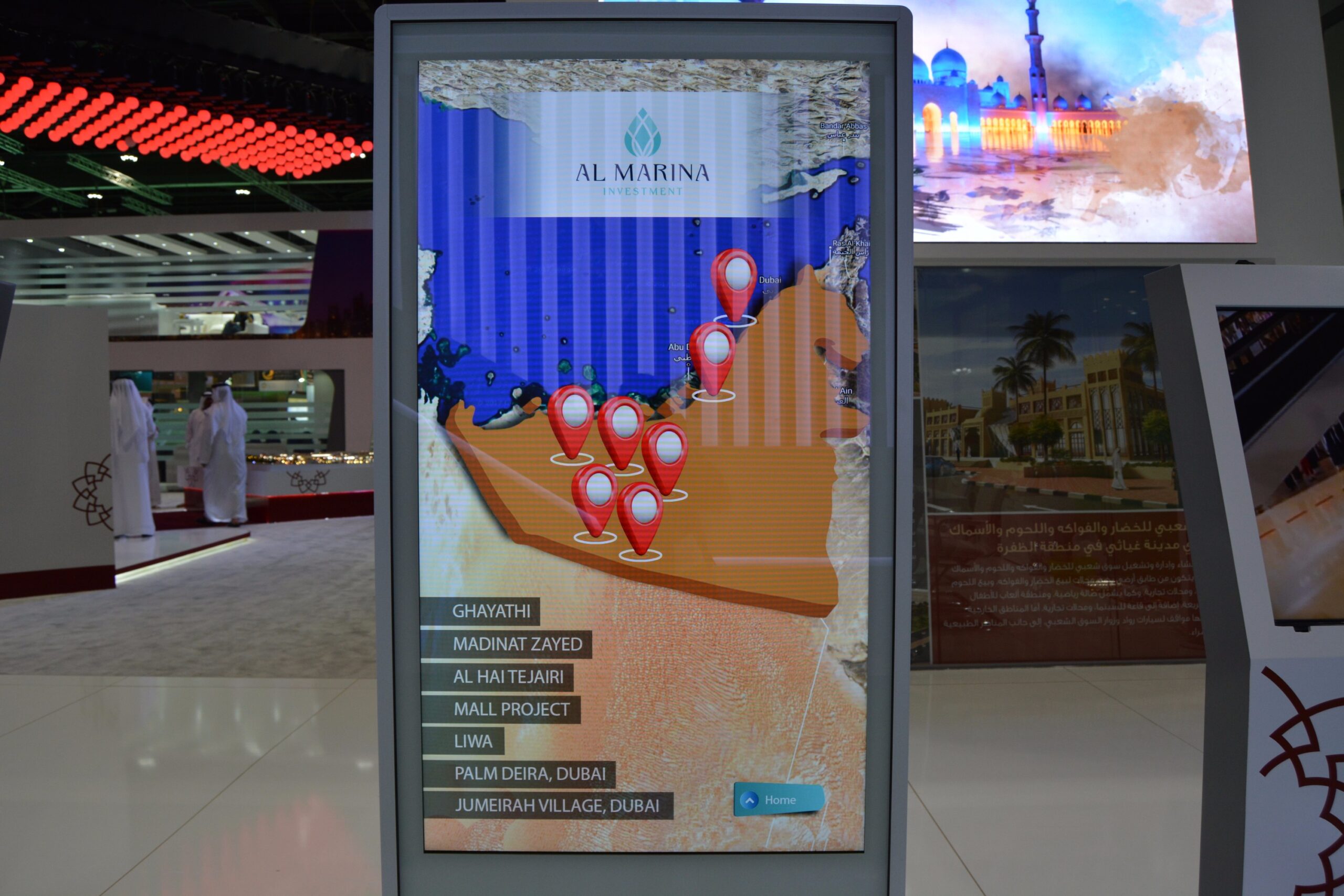 Al Marina Investment interactive wayfinding kiosk at exhibition.