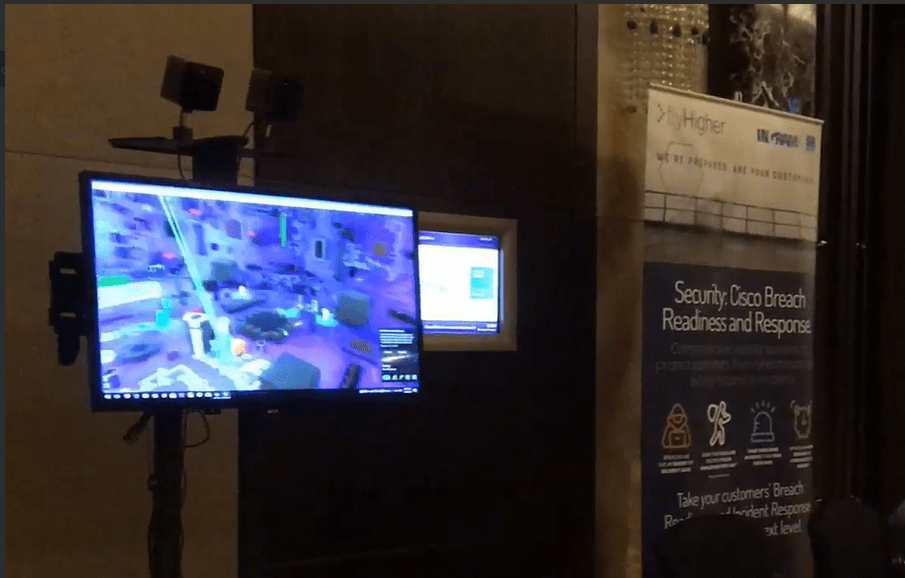 VR gamified brand engagement booth featuring Cisco security superhero reaction game