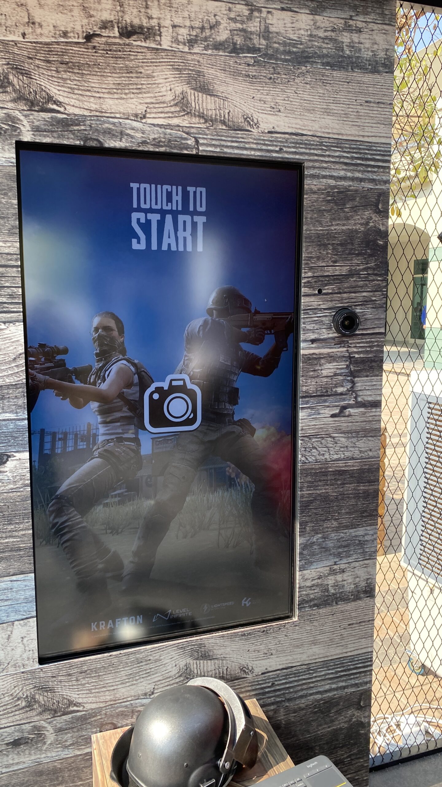 Visitors engaging with the PUBG interactive photo opportunity kiosk produced by PearlQuest.